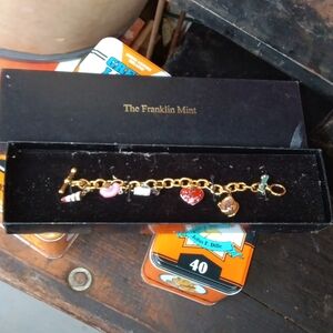 Franklin Mint Gold-Tone Charm Bracelet with Red and Pink Enamel Hearts